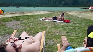 Voyeur masturbates on the strand in obverse of my spouse